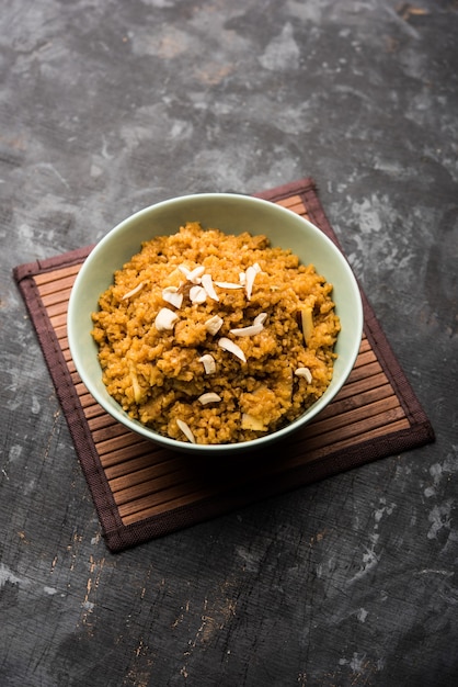 Wheat Laapsi or Lapsi or Shira or Halwa is an Indian sweet dish made of broken wheat or Daliya pieces and ghee along with nuts, raisins and dried fruits