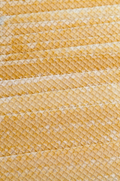 Фото Пшеничные вафли с квадратным рисунком, свежие хрустящие вафли, сложенные вместе