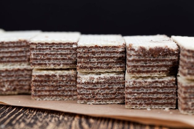 Wheat waffles with chocolate filling, a bunch of crispy waffles made of wheat flour and chocolate filling