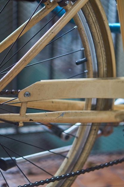 Wheel of a brown vintage bicycle