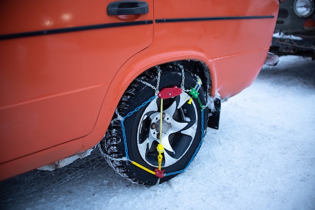 Photo wheel car in chains against sliding