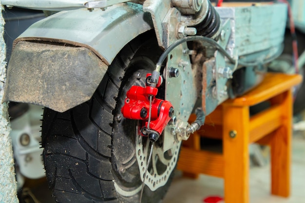 Wheel with a motor from an electric scooter