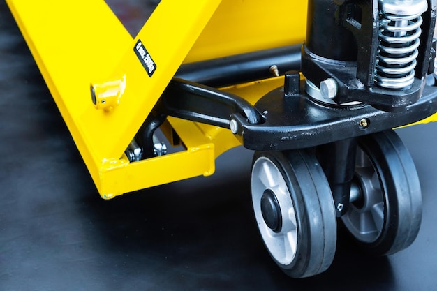 Wheelbarrow for transportation of pallets with cargo closeup