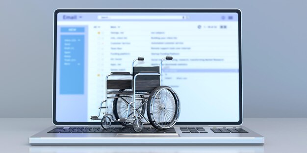 Wheelchair on a laptop keyboard office desk background 3d\
illustration