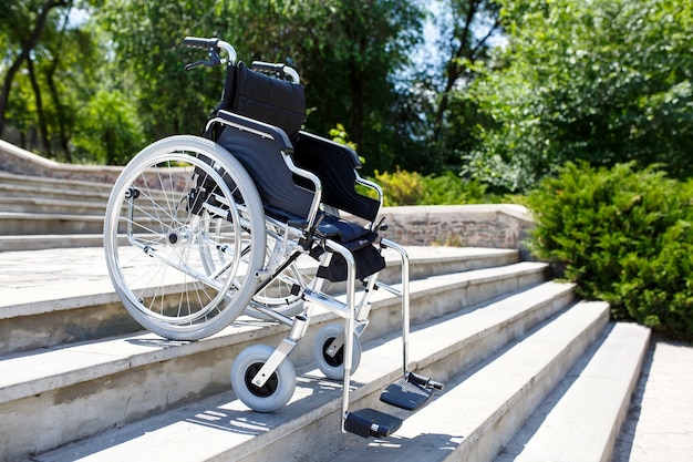 Photo wheelchair near the steps.