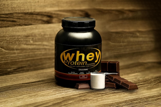 Whey Protein bottle bodybuilding supplement Protein powder GYM Supplements chocolate flavour