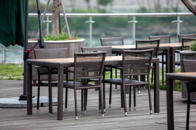 whicker chairs and tables at outdoor cafe
