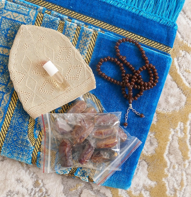 While muslims come from Hajj they bring dates prayer rugs and rosaries as a gift