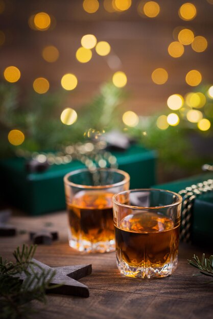 Whiskey brandy or liquor shot and Christmas decorations