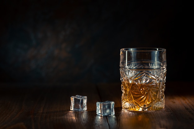 Whiskey in glass with ice