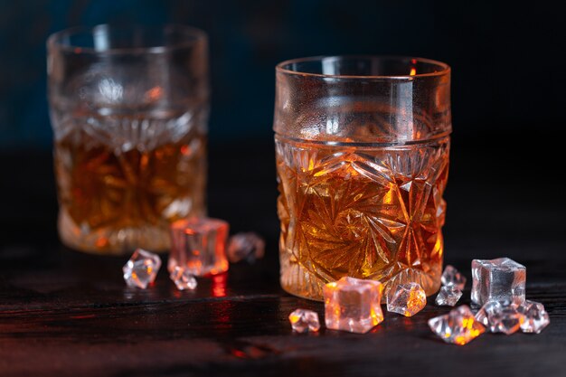 Whiskey in glass with ice