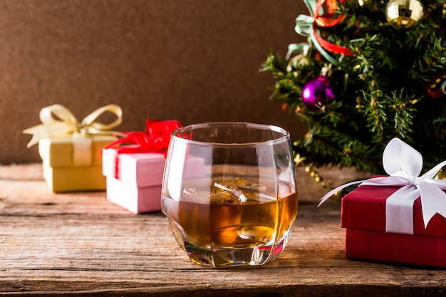 whiskey on wooden table on Christmas day