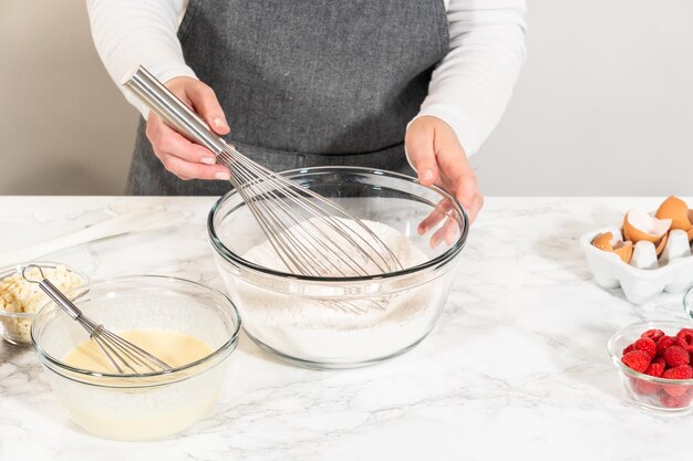 Whisking delight bundt cake batter preparation begins