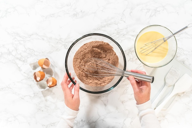 Whisking delight chocolate bundt cake in the making