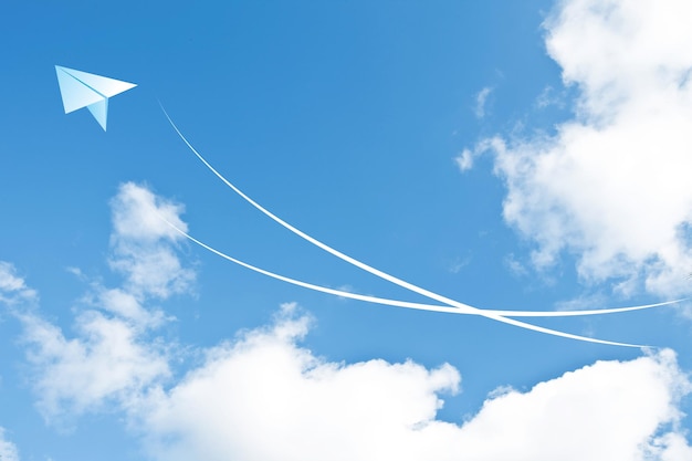 a white airplane with a white arrow in the sky