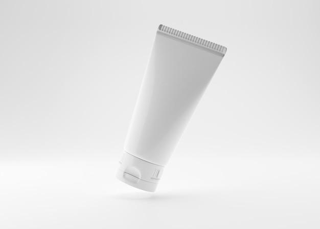 Фото Белая и пустая косметическая кремовая трубка без маркировки на белом фоне презентация продукта по уходу за кожей