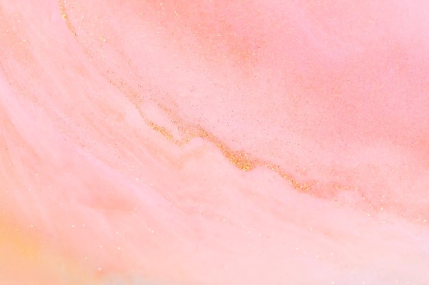 写真 白とピンクのアクリル塗料と輝く金色の輝き 液体塗料 抽象的な背景