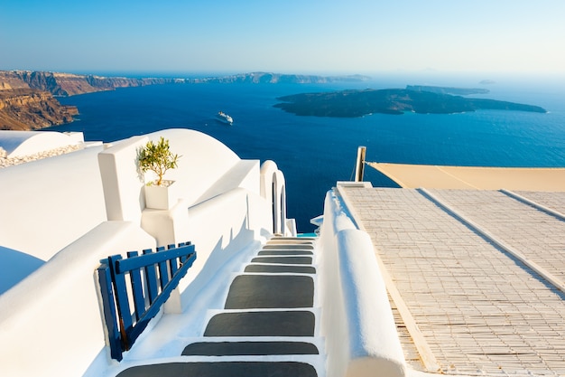 White architecture and blue sea on Santorini island Greece Stairs to the sea