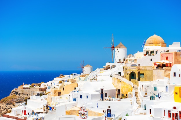 White architecture in Oia town on Santorini island, Greece. Famous travel destination. Summer landscape