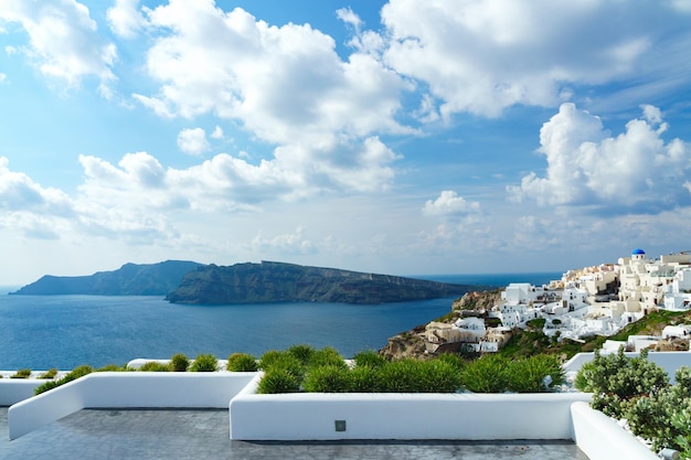 White architecture on Santorini island Cyclades Greece White buildings with blue doors and windows Aegean sea view