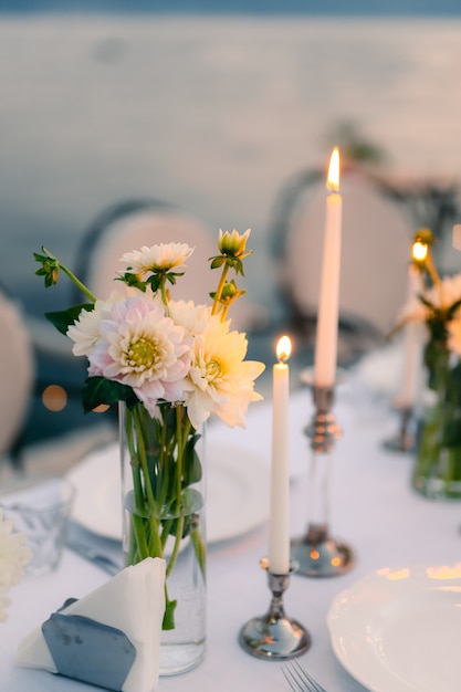 White asters on the table in the restaurant wedding decorations