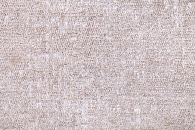 White background of soft, fleecy cloth. Texture of textile closeup