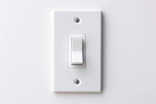 A white background with a black light switch