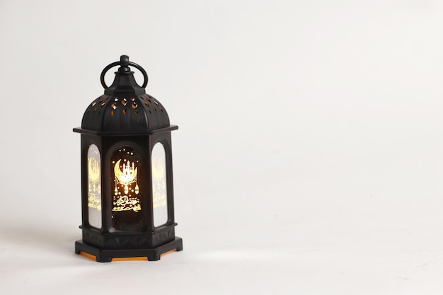 white background with old islamic lantern on the right