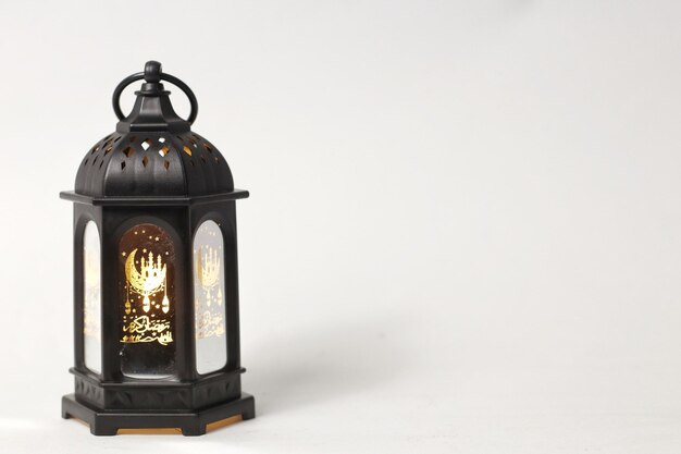 white background with old islamic lantern on the right