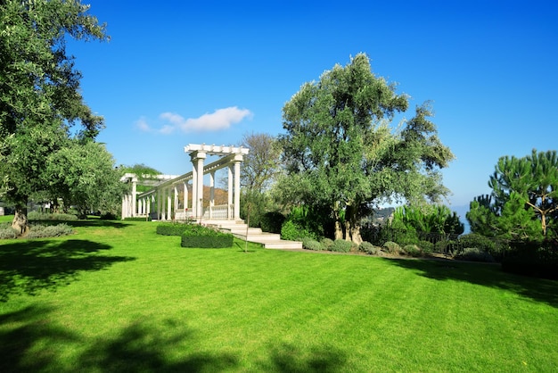 White balustrade with columns in a city park