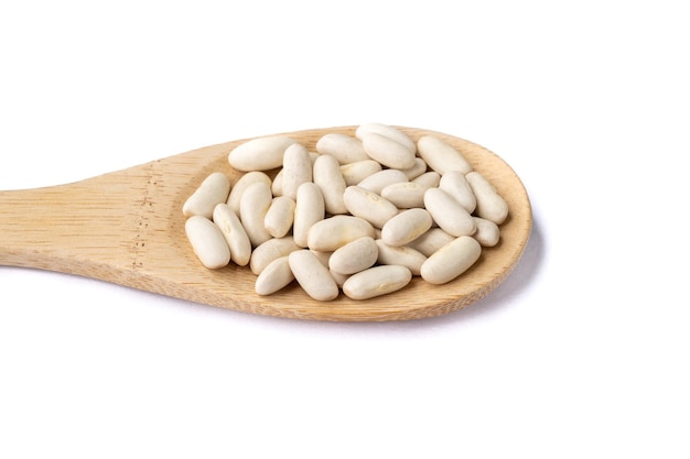 White beans in a spoon isolated over white background