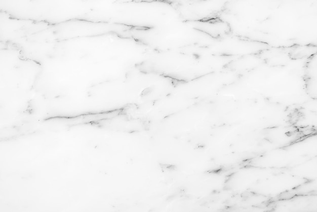 白の美しい天然大理石の石のパターンの抽象的な背景