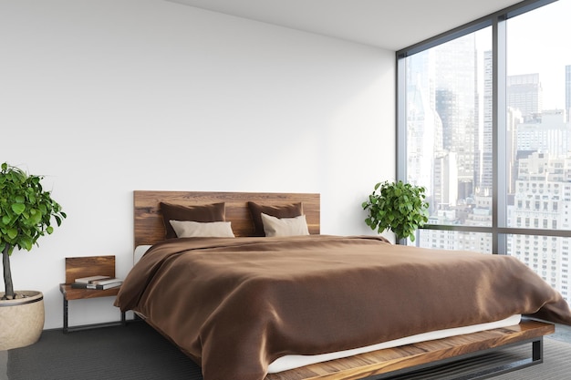 マスター ベッド、ベッドサイド テーブル、パノラマ窓に茶色のベッドカバーが付いた白い寝室のインテリア。 3D レンダリングのモックアップ