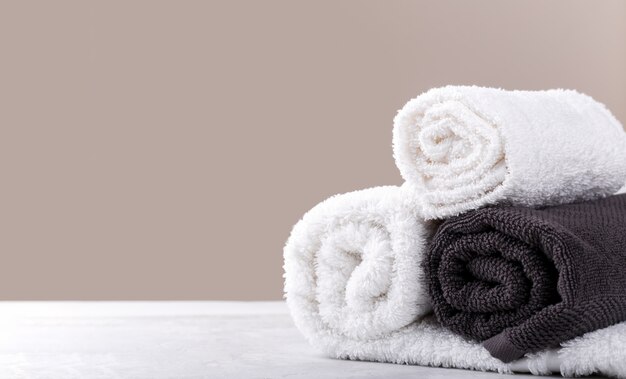 Photo white and beige soft rolled cotton towels