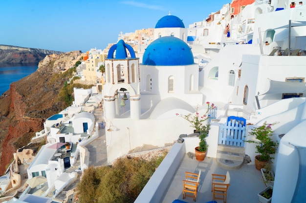 White belfries Santorini island Greece