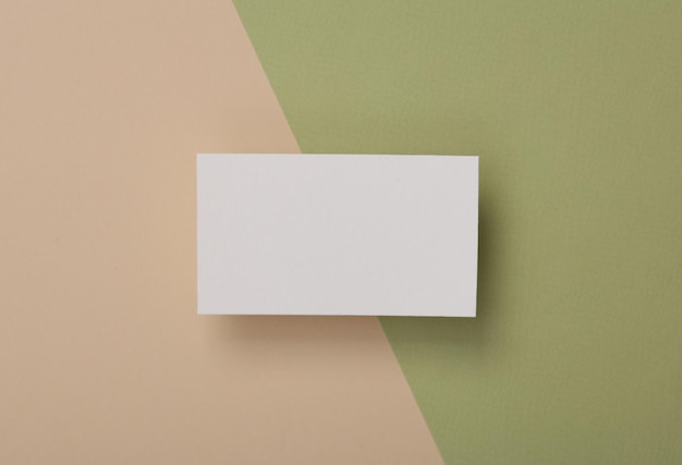 White Blank business card for branding on beige green background
