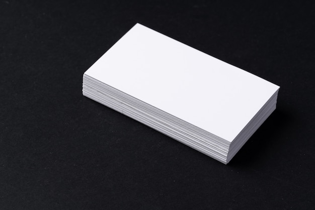 White blank business cards on black