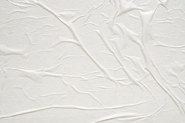 White blank crumpled and creased paper poster texture background