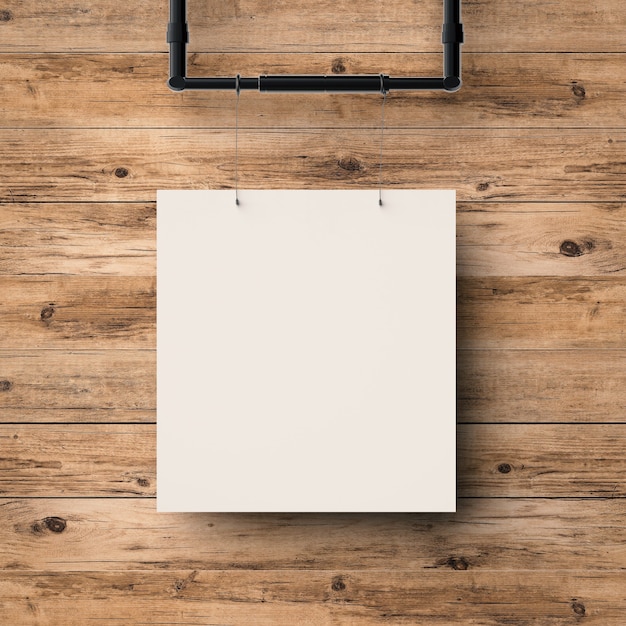 White blank frame hanging on timber wall background