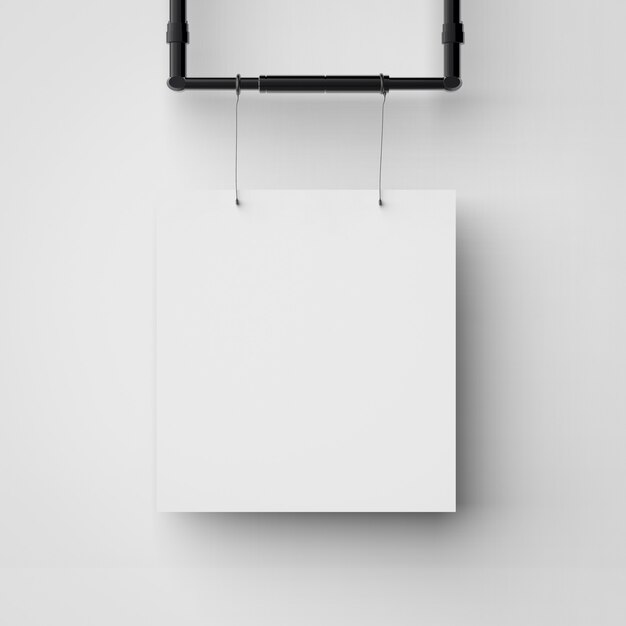 Photo white blank frame hanging on white background
