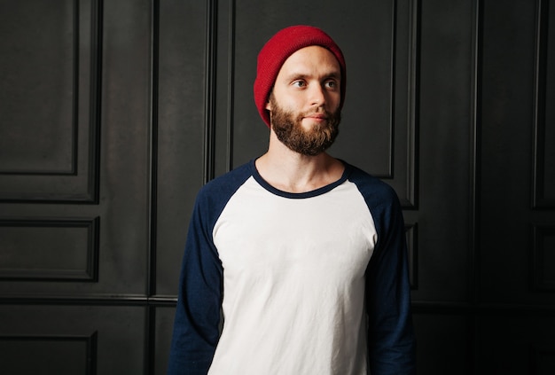 Photo white blank t-shirt with space for your logo on a hipster man with a beard