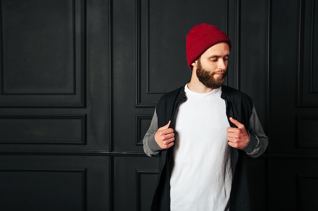 White blank t-shirt with space for your logo on a hipster man with a beard