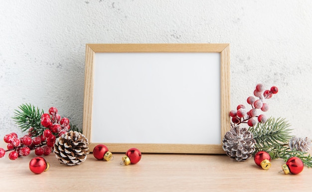 White blank wooden frame mockup with Christmas decorations