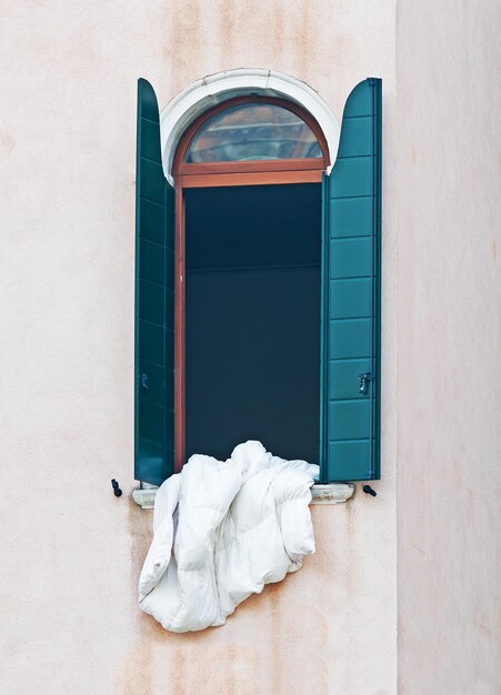 White blanket in an open window