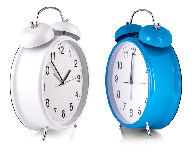 The white and blue Alarm clock isolated on white background