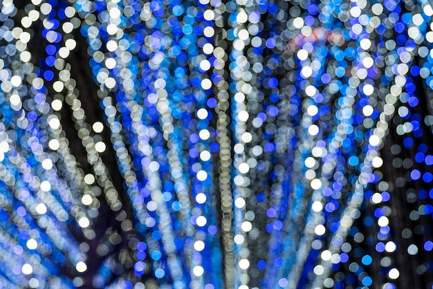 White blue bokeh lights of Christmas lights and New year