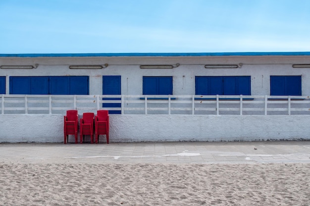 White and blue building on the beach