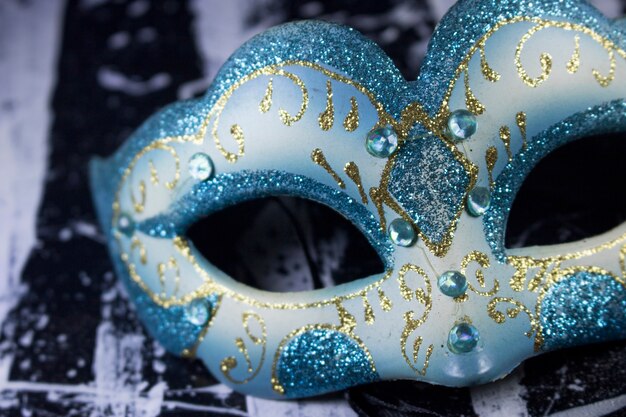 white blue glitter diamond masquerade mask party on black and white acrylic paint