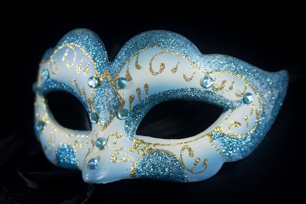 white blue glitter masquerade mask party isolated black