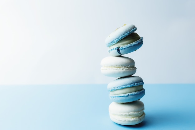 White and blue macaroons on the table, macaroons.